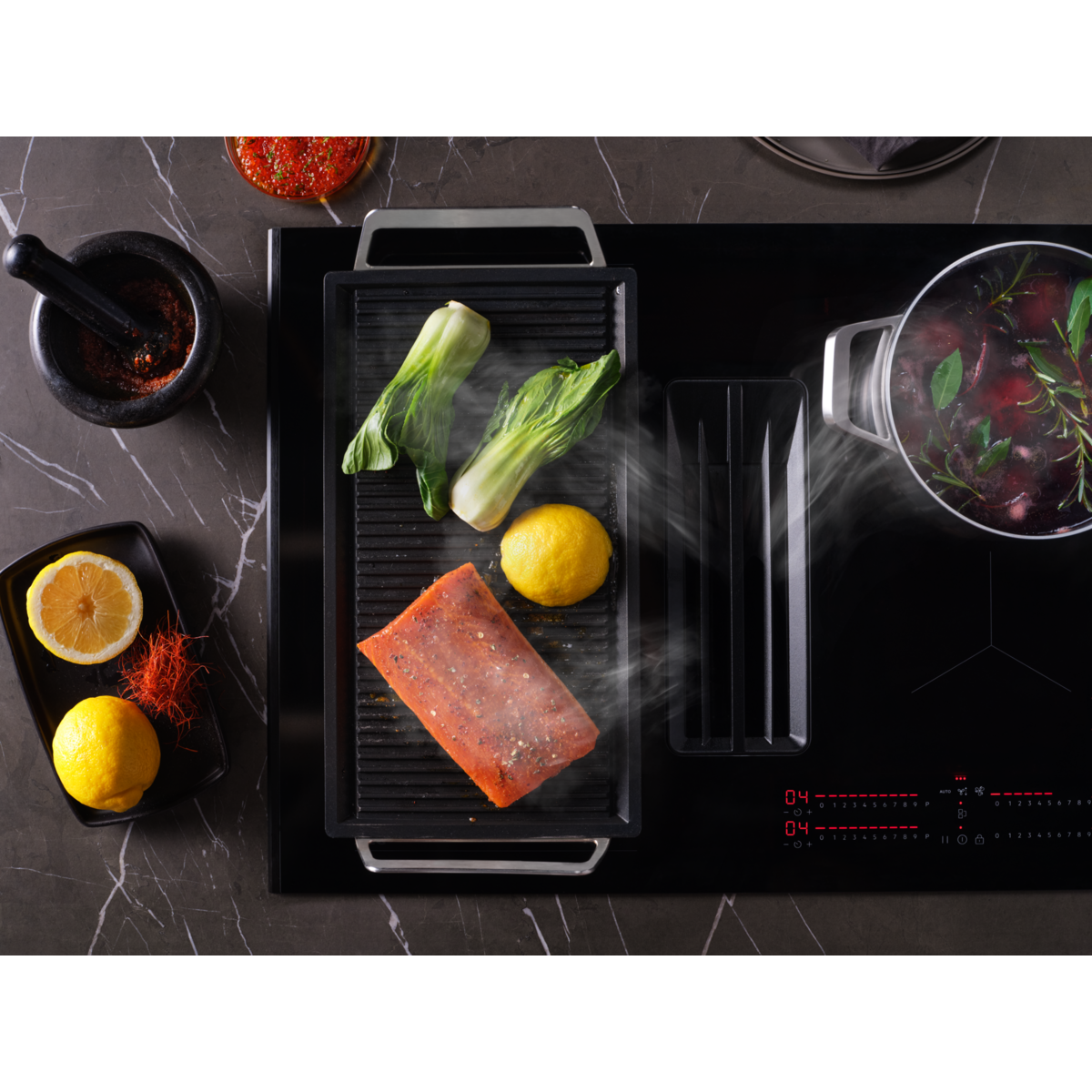 AEG - Induktionshäll med inbyggd fläkt - TCH74B01CB