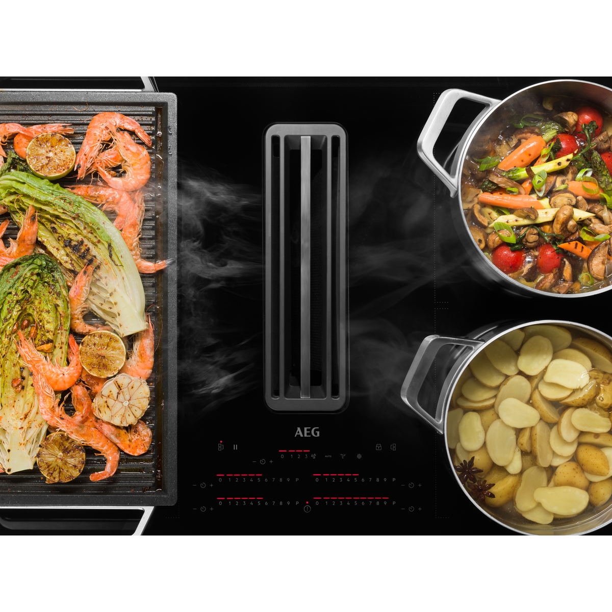 AEG - Induktionshäll med inbyggd fläkt - CCS84751CB
