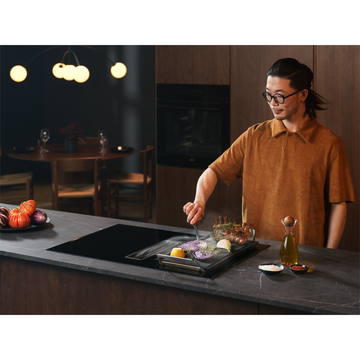AEG - Induktionshäll med inbyggd fläkt - CCS84543CB