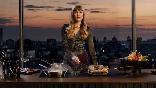 Woman in modern kitchen