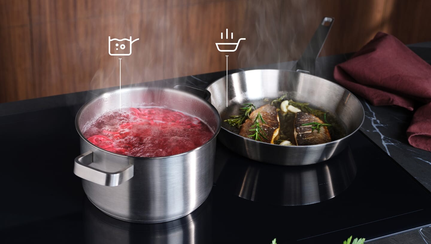 Mat tillagas på en induktionshäll med funktionen SenseBoil & Fry.