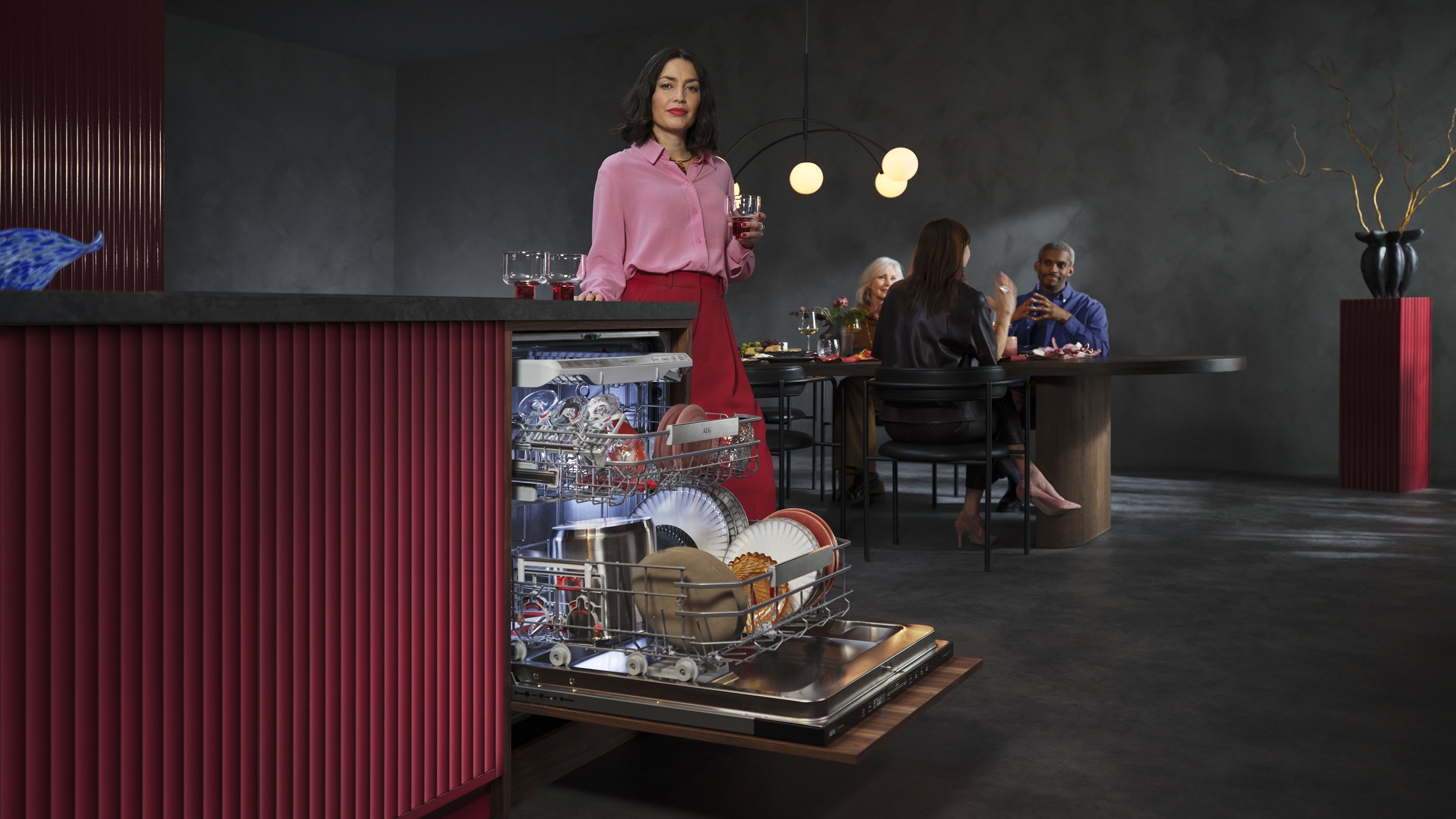 Woman unloading dishwasher